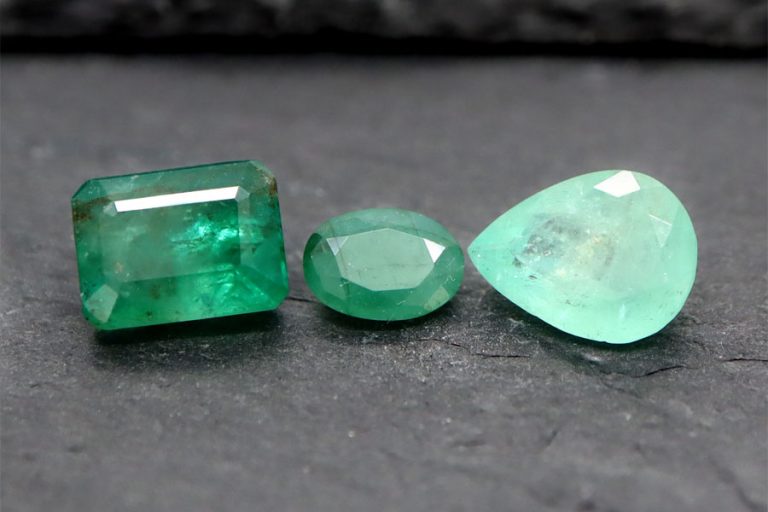 Three emeralds on slate