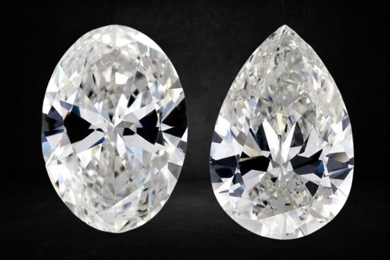 An image of an oval and pear diamond on a black background showing bow tie effect in the two stones