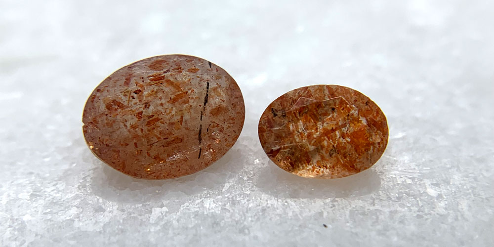 Two Faceted Sunstone Gemstones